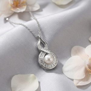 925 Sterling Silver Elegant White Pearl and Baguette Diamond Infinity Twist Pendant Necklace